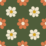 a repeating pattern of stylized flowers in shades of orange and white against a dark green background.