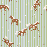 a pattern of brown horses with white stars on a striped background.