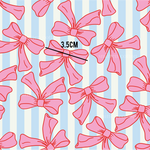 a blue and white striped background with pink bows