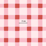 a repeating pattern of pink and red squares, with a small black line indicating the width of the pattern, which is 2 cm.