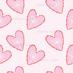 pink hearts with a bow on a white background