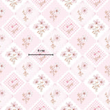 The image is a repeating pattern of pink and white flowers and hearts on a diamond-shaped background.