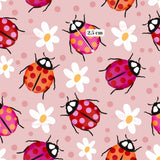 a repeating pattern of colorful ladybugs and white flowers against a pink background.