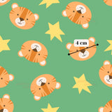 a repeating pattern of cartoon tiger faces and yellow stars on a green background.