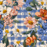 The image is a vibrant and colorful floral pattern featuring a variety of flowers, including daisies, roses, and other blooms, set against a blue and white checkered background.