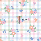 a repeating pattern of pastel-colored flowers and leaves on a checkered background.