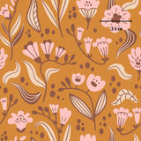 The image is a repeating pattern of various pink flowers and leaves against a brown background.