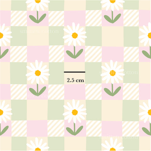 a picture of a flower on a checkered background