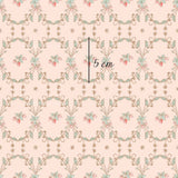 a pink wallpaper with a floral design on it