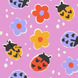 a pattern of colorful ladybug illustrations on a pink background.