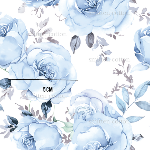 a blue rose pattern on a white background