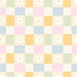 a checkered pattern with flowers on it