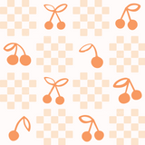 a pattern of cherries on a checkered background