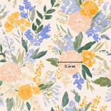The image is a vibrant and colorful floral pattern with various types of flowers and leaves. The flowers include yellow, orange, and blue hues, creating a lively and cheerful atmosphere. The leaves are green and add to the overall beauty of the pattern. The image is described as a 3.5 cm image, which indicates its size relative to the viewer.
