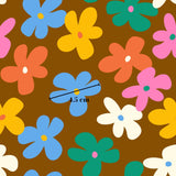 a repeating pattern of colorful flowers, including blue, orange, and pink flowers, against a brown background.