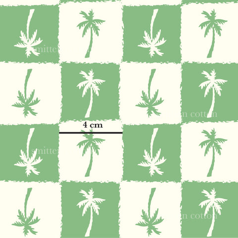 a green and white checkered pattern with a palm tree