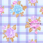 a repeating pattern of blue and pink roses on a purple and blue checkered background.
