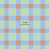 The image is a square pattern with alternating blue and orange squares, and there is a line of text in the center that reads "2 cm".