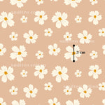 a repeating pattern of white flowers against a peach background.