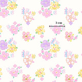 a repeating pattern of colorful flowers in shades of pink, yellow, and purple against a white background.