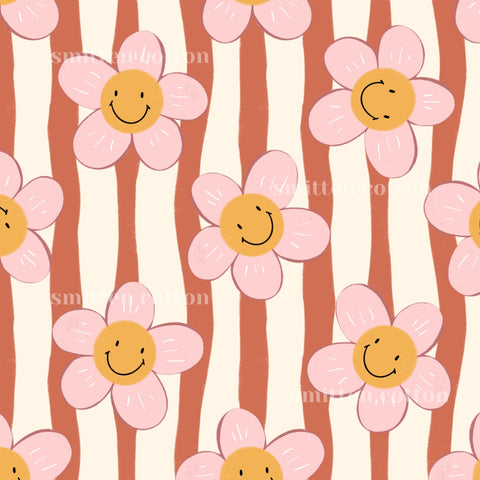 a repeating pattern of pink and white flowers with smiling faces, creating a cheerful and whimsical design.