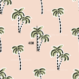 a pattern of palm trees on a pink background