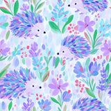 The image is a vibrant and colorful pattern featuring various flowers, leaves, and hedgehog illustrations in shades of purple, blue, and green.