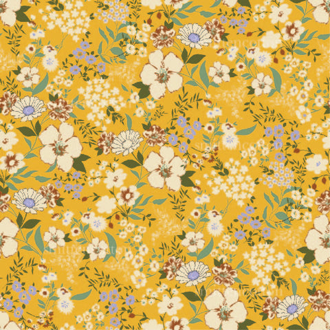 a yellow background with flowers and leaves
