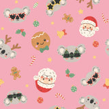 a repeating pattern of various Christmas-themed characters and objects, including Santa Claus, koalas, gingerbread cookies, candy canes, and other festive elements, all set against a pink background.