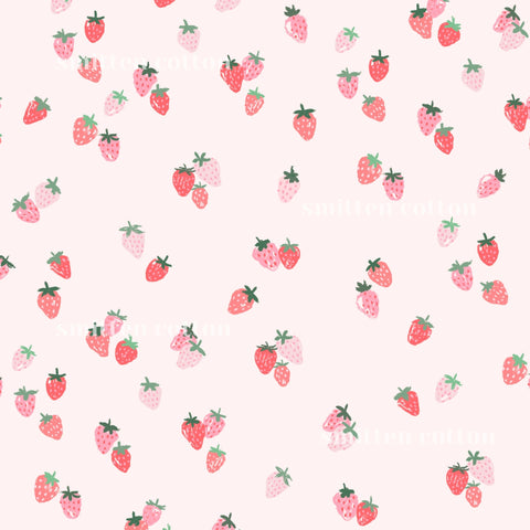 a repeating pattern of pink and red strawberries scattered across a light pink background.