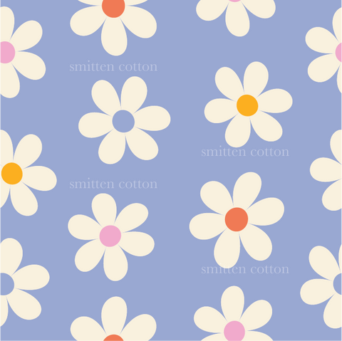 a pattern of white and pink flowers on a blue background