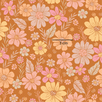 a brown background with pink and yellow flowers