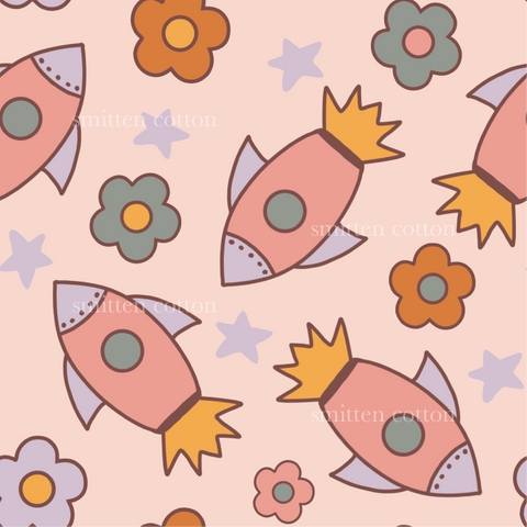 a pink background with a rocket ship and flowers