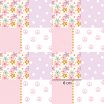 a patchwork pattern with flowers and peace signs